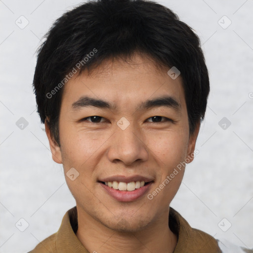 Joyful asian young-adult male with short  brown hair and brown eyes