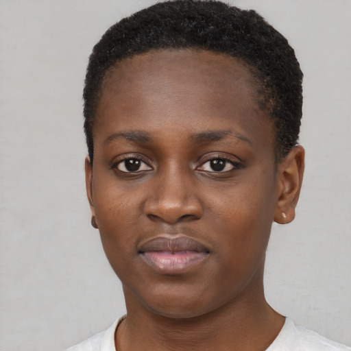 Neutral black young-adult female with short  brown hair and brown eyes