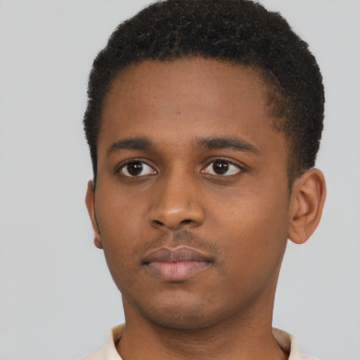 Neutral black young-adult male with short  brown hair and brown eyes