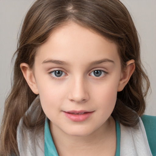 Joyful white child female with medium  brown hair and brown eyes