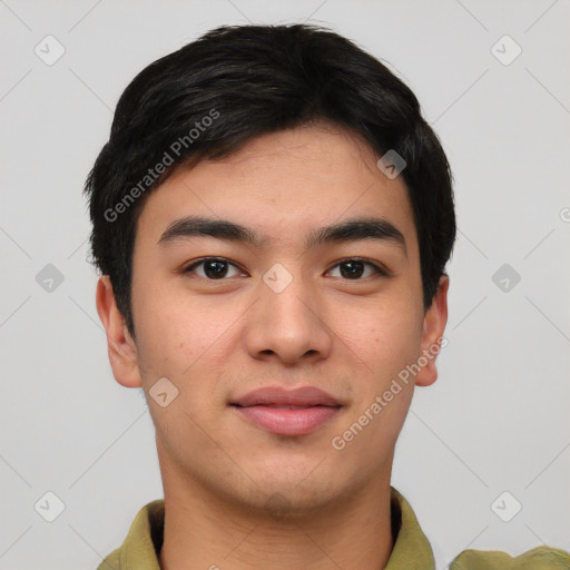 Joyful asian young-adult male with short  black hair and brown eyes