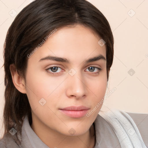 Neutral white young-adult female with medium  brown hair and brown eyes