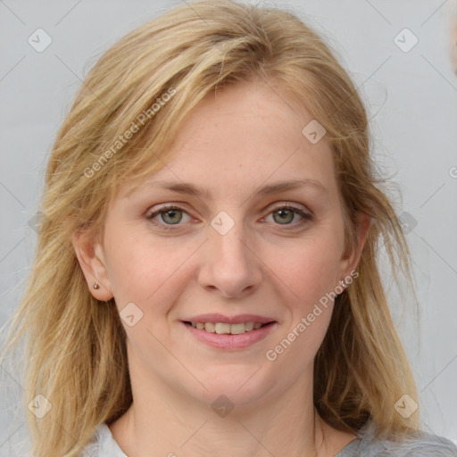 Joyful white young-adult female with medium  brown hair and blue eyes