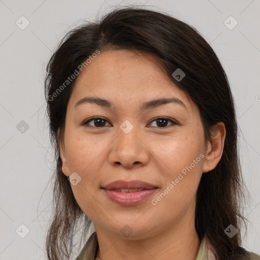 Joyful white adult female with medium  brown hair and brown eyes