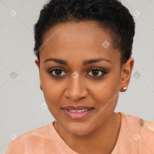 Joyful black young-adult female with short  brown hair and brown eyes