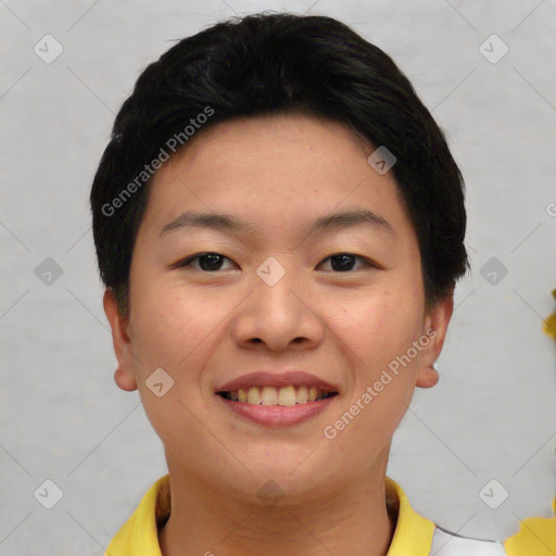 Joyful asian young-adult female with short  brown hair and brown eyes