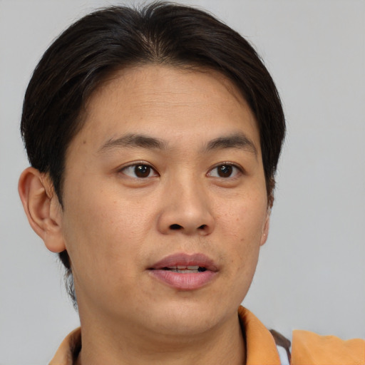 Neutral asian young-adult male with short  brown hair and brown eyes