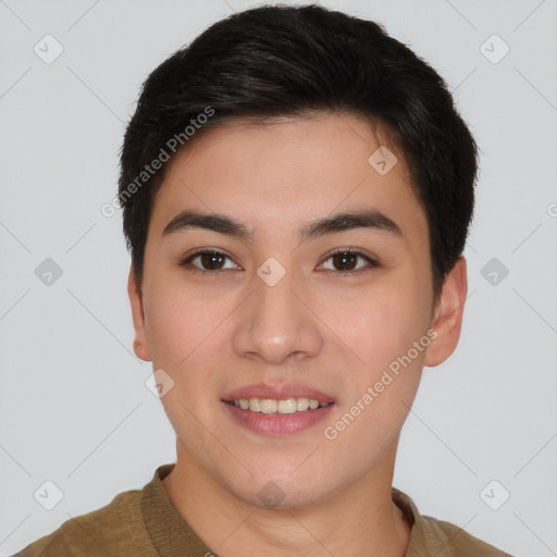 Joyful asian young-adult male with short  brown hair and brown eyes