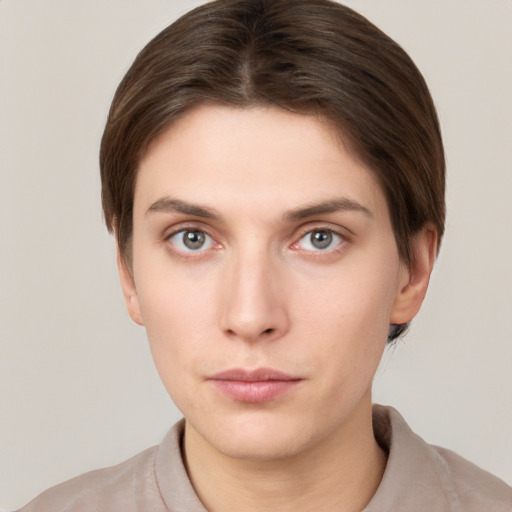 Neutral white young-adult female with short  brown hair and brown eyes