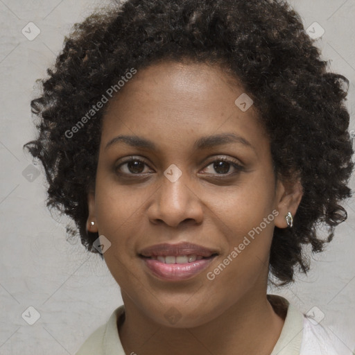 Joyful black young-adult female with medium  brown hair and brown eyes