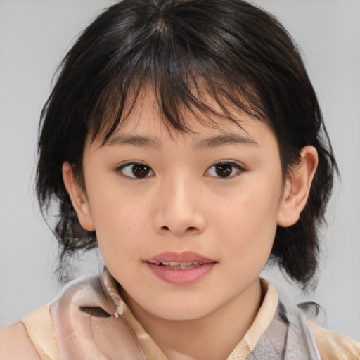 Joyful asian child female with medium  brown hair and brown eyes