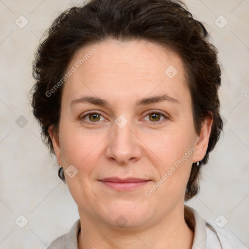 Joyful white adult female with short  brown hair and brown eyes