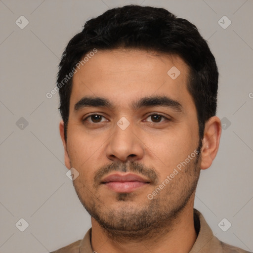 Neutral latino young-adult male with short  black hair and brown eyes