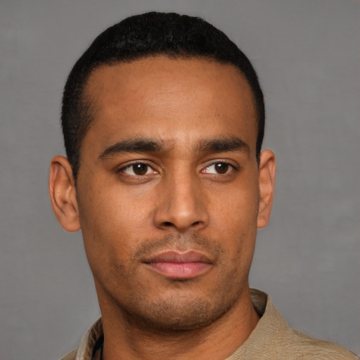 Neutral latino young-adult male with short  black hair and brown eyes