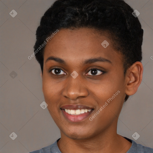 Joyful black young-adult female with short  black hair and brown eyes