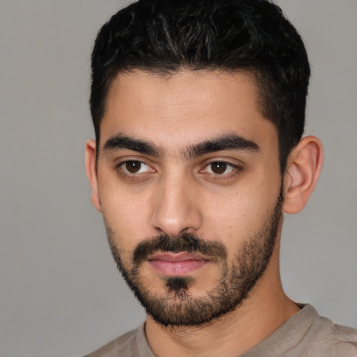 Neutral latino young-adult male with short  black hair and brown eyes