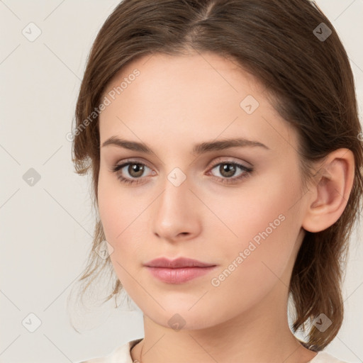 Neutral white young-adult female with medium  brown hair and brown eyes