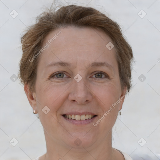 Joyful white adult female with short  brown hair and brown eyes