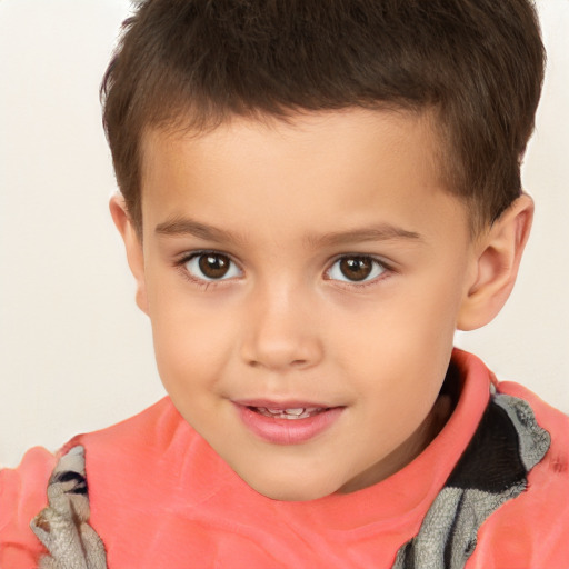 Joyful white child male with short  brown hair and brown eyes