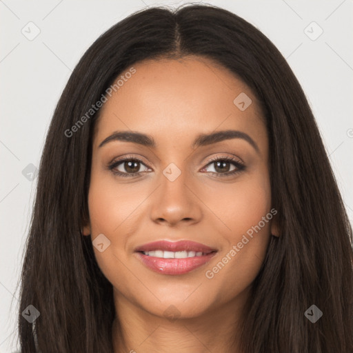 Joyful latino young-adult female with long  black hair and brown eyes