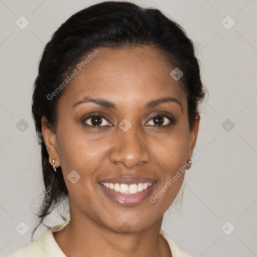 Joyful latino young-adult female with medium  brown hair and brown eyes