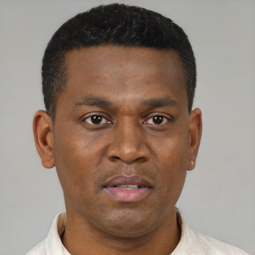Neutral black young-adult male with short  black hair and brown eyes