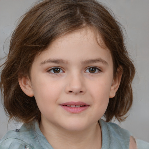 Joyful white child female with medium  brown hair and brown eyes