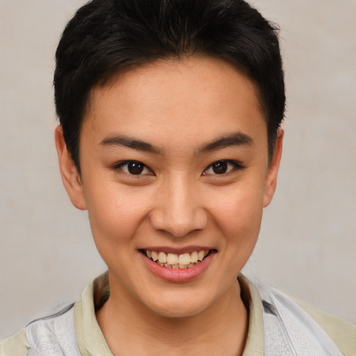 Joyful latino young-adult female with short  brown hair and brown eyes