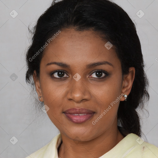 Joyful black young-adult female with medium  brown hair and brown eyes