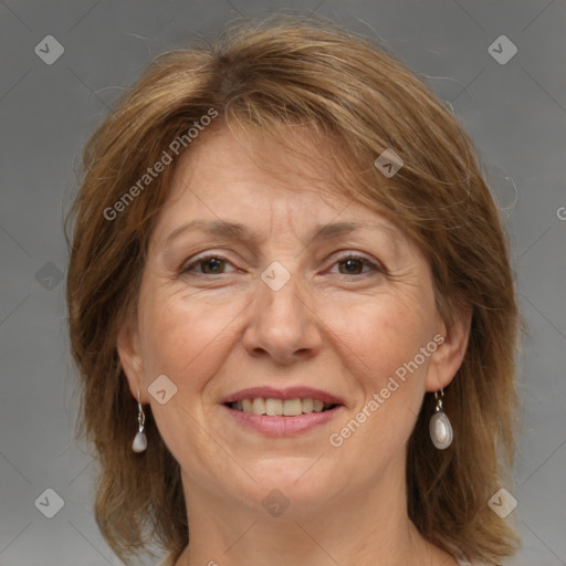 Joyful white adult female with medium  brown hair and grey eyes