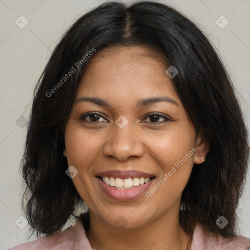 Joyful latino young-adult female with medium  brown hair and brown eyes