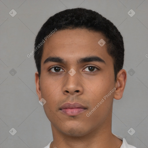 Neutral latino young-adult male with short  black hair and brown eyes