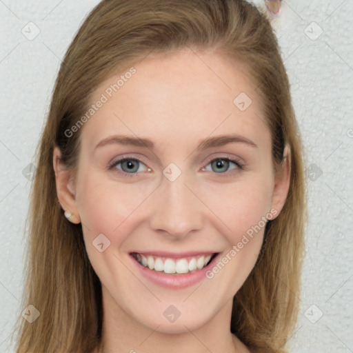 Joyful white young-adult female with long  brown hair and blue eyes