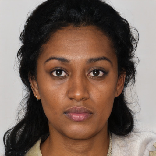 Neutral black young-adult female with medium  black hair and brown eyes