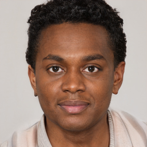 Neutral black young-adult male with short  brown hair and brown eyes