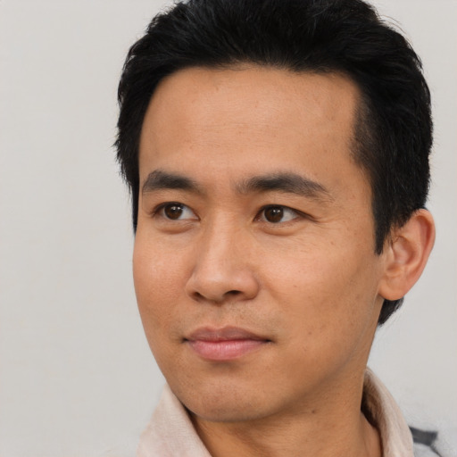 Neutral asian adult male with short  black hair and brown eyes