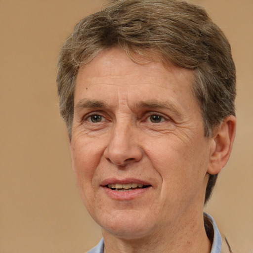 Joyful white middle-aged male with short  brown hair and brown eyes