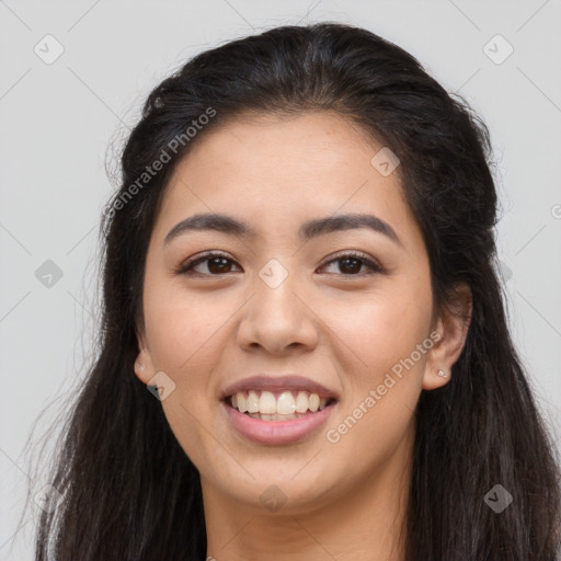 Joyful asian young-adult female with long  brown hair and brown eyes