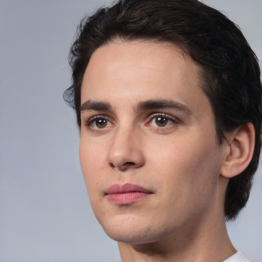 Joyful white young-adult male with medium  brown hair and brown eyes