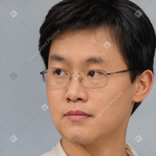 Neutral asian young-adult male with short  brown hair and brown eyes