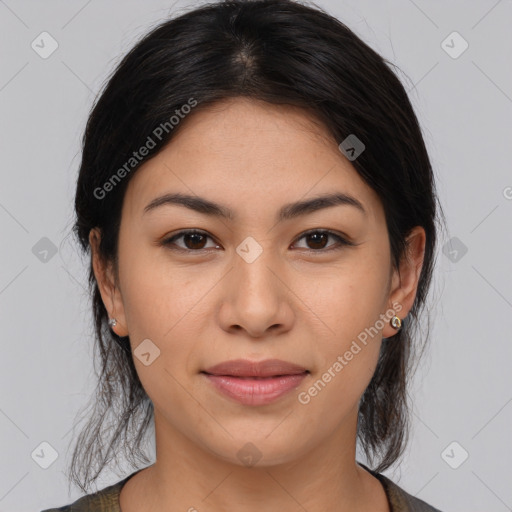 Joyful latino young-adult female with medium  brown hair and brown eyes