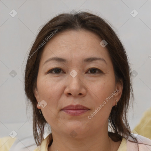 Joyful white adult female with medium  brown hair and brown eyes