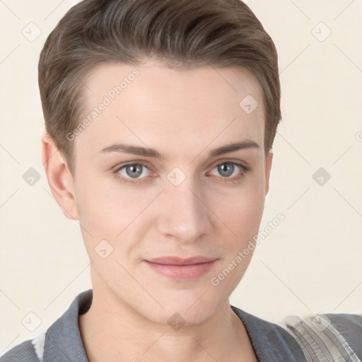 Joyful white young-adult female with short  brown hair and grey eyes