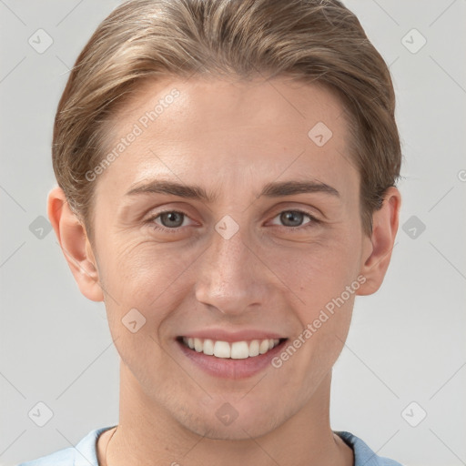 Joyful white young-adult female with short  brown hair and grey eyes