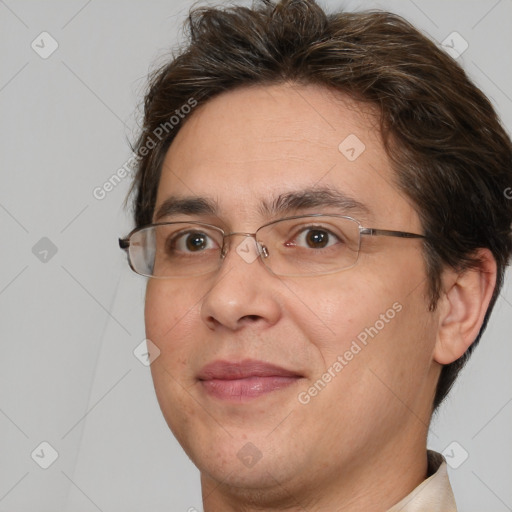 Joyful white adult male with medium  brown hair and brown eyes