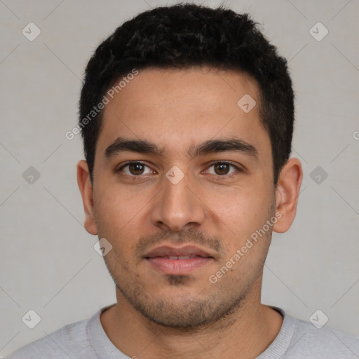 Neutral latino young-adult male with short  black hair and brown eyes