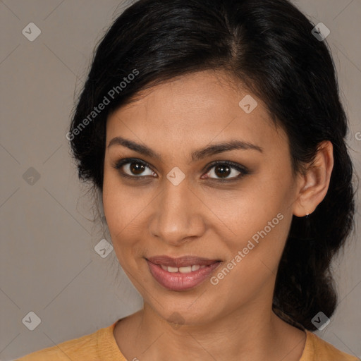 Joyful latino young-adult female with medium  brown hair and brown eyes