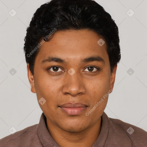 Joyful latino young-adult male with short  black hair and brown eyes