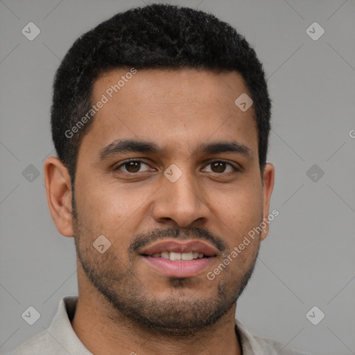 Joyful latino young-adult male with short  brown hair and brown eyes