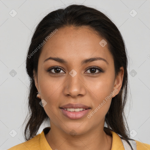 Joyful latino young-adult female with medium  brown hair and brown eyes